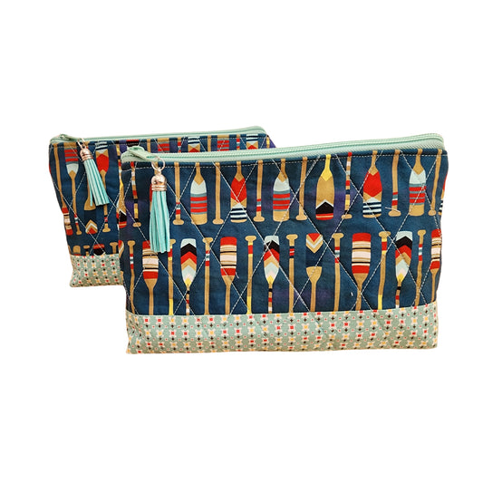 Quilted cosmetic bag with colorful oars print, handmade zippered travel pouch with mint tassel.